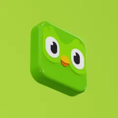 Zielona maskotka Duolingo. Dowiedz się, jak zmienić poziom trudności w aplikacji, aby nauka była przyjemniejsza.