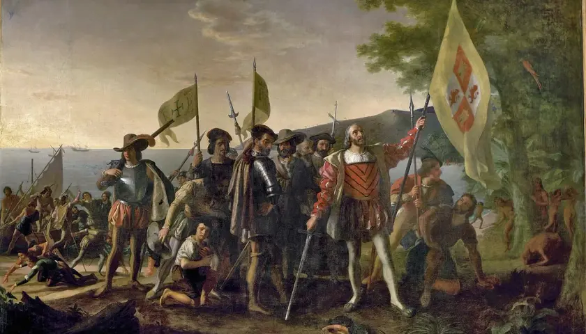 Kolumb i jego ludzie lądują na nowej ziemi, gdzie dopłynął Kolumb. W tle statki i tubylcy.