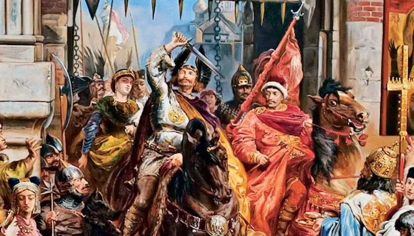 Król Bolesław Chrobry z mieczem wzniesionym do góry, w otoczeniu rycerzy i dam. Obraz przedstawia scenę historyczną, nawiązującą do przydomków królów polskich.
