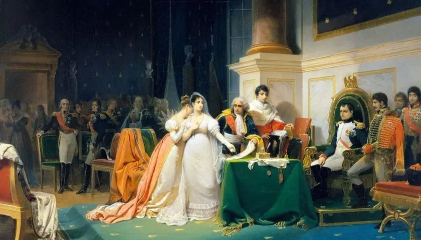 Napoleon w otoczeniu dworzan, obok niego siedzi jego pierwsza żona, Józefina, w białej sukni.
